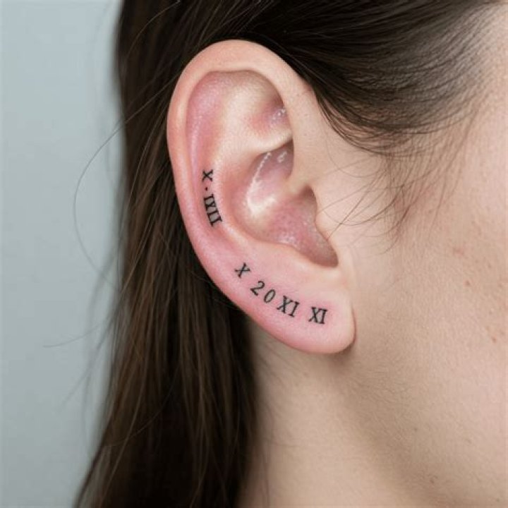 Roman Numeral Tattoos Behind The Ear